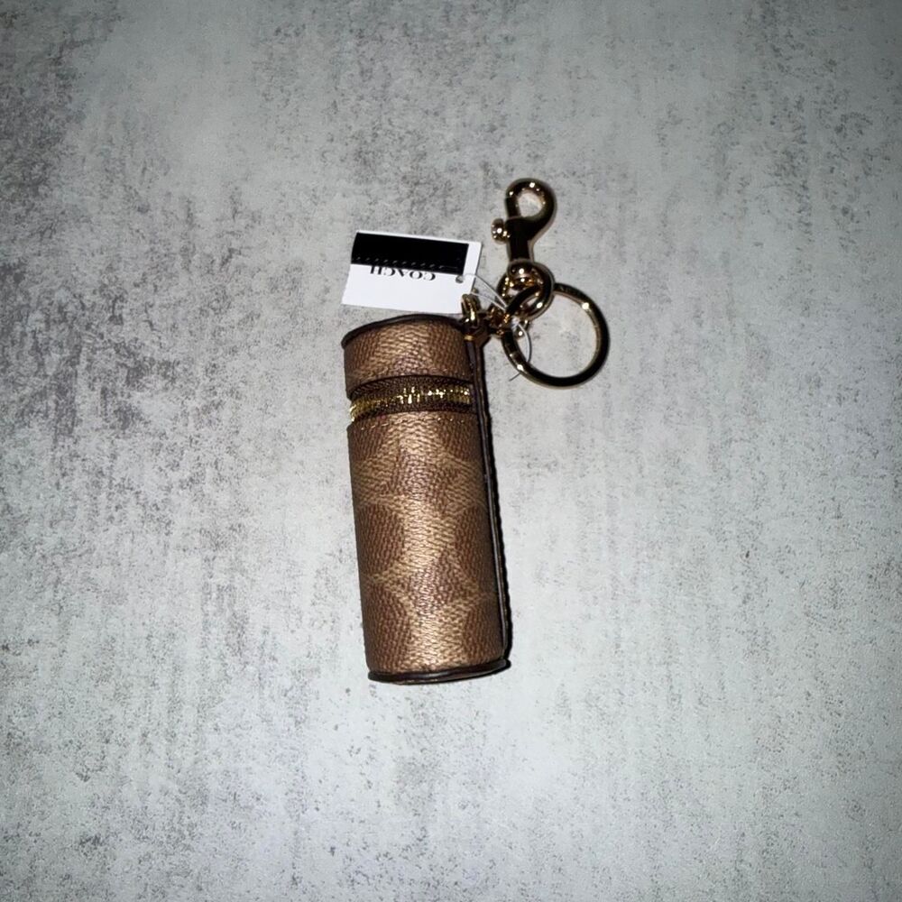 Coach brown lipstick case